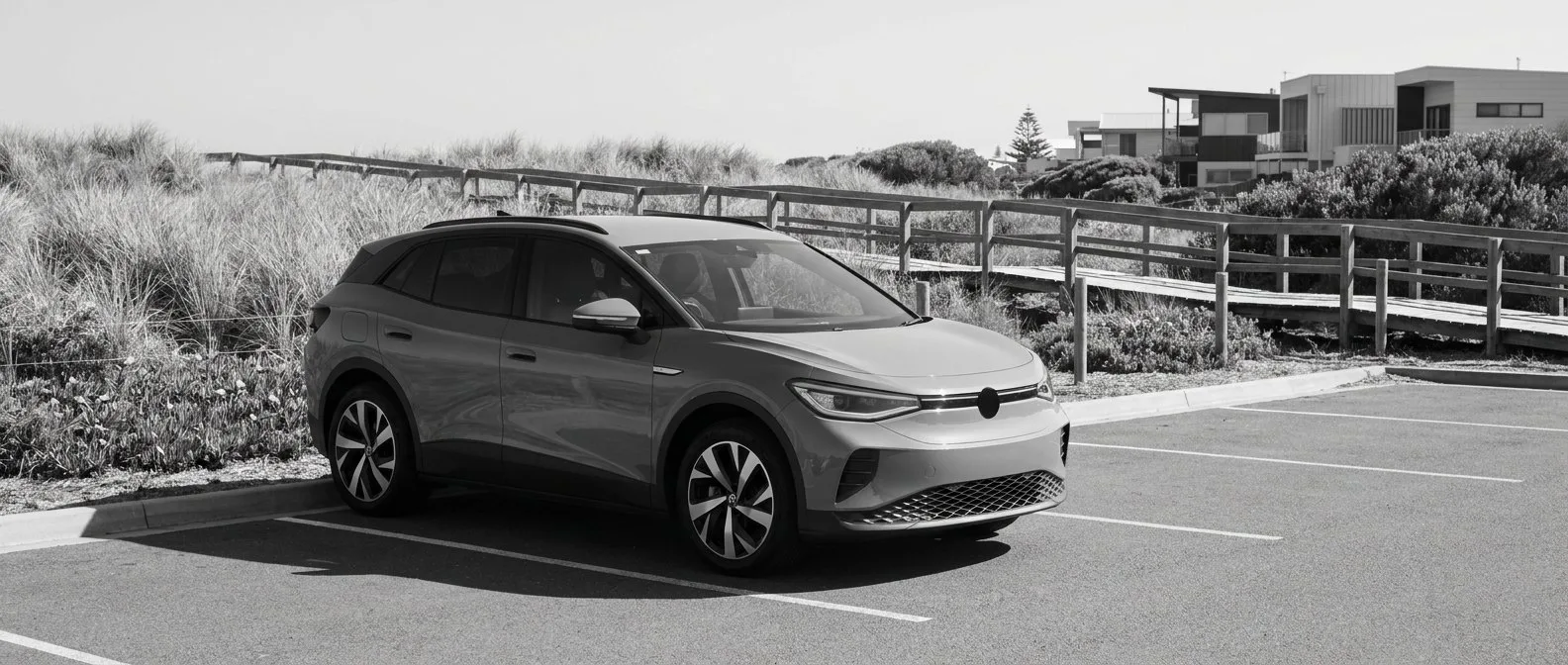Electric SUV parked at a Northern Beaches beachside car park
