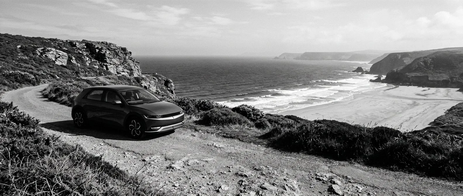 Electric car parked on a clifftop road in Sydney’s eastern suburbs